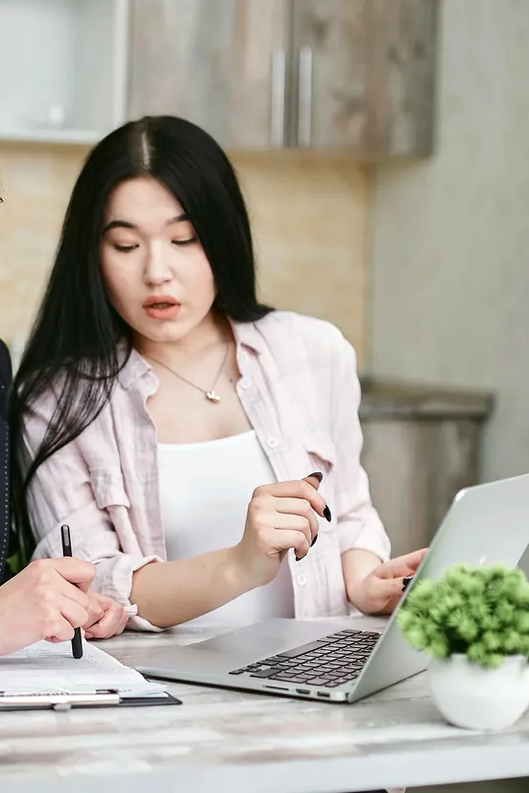 Professional reviewing privacy and account information in a calm workspace.